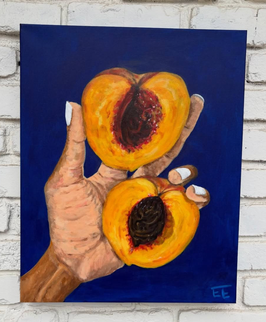 Hand Holding Peaches